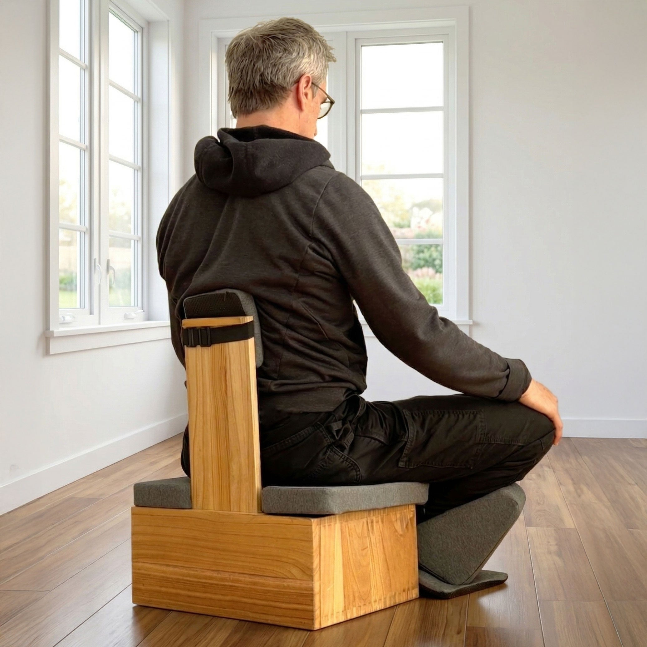 White Ungloo Box portable meditation chair with back and hip support, designed for comfortable, relaxed meditation sessions.