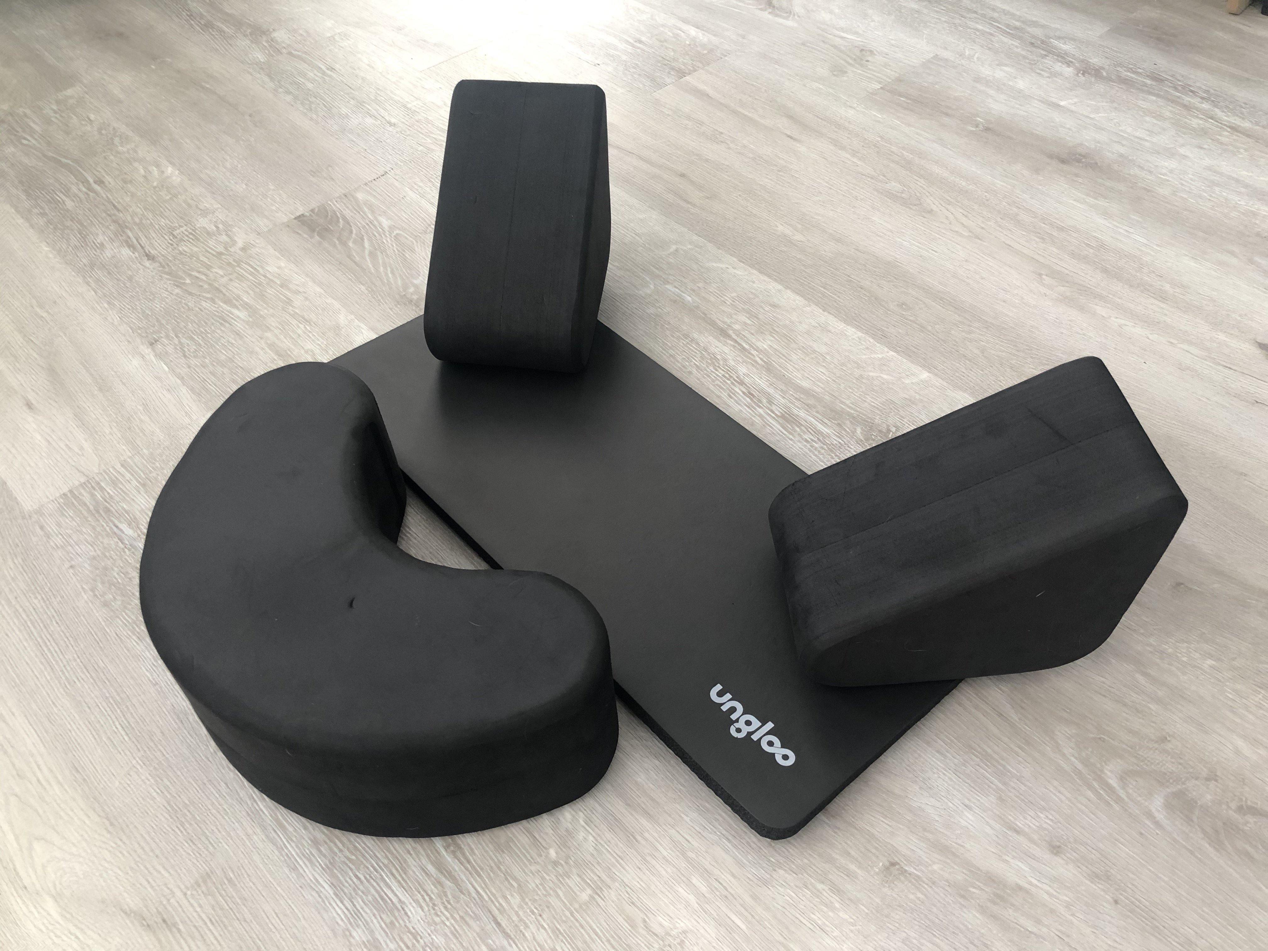 Picture showing the unboxed SIT3 Meditation Kit. It comes with two leg supports, comfortable floor pad, and meditation cushion.