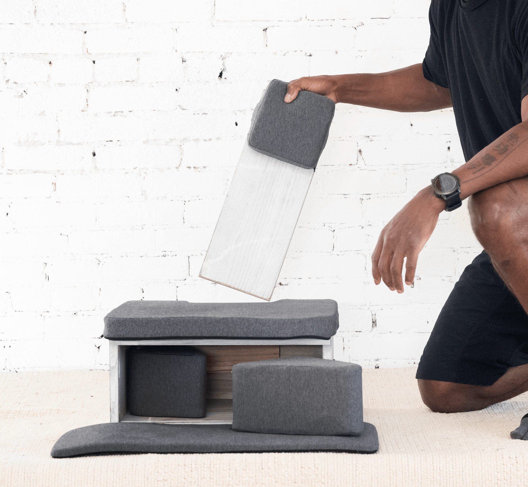 Portable Ungloo Box meditation chair with back and hip support, showcasing its ergonomic design and compact, lightweight build.
