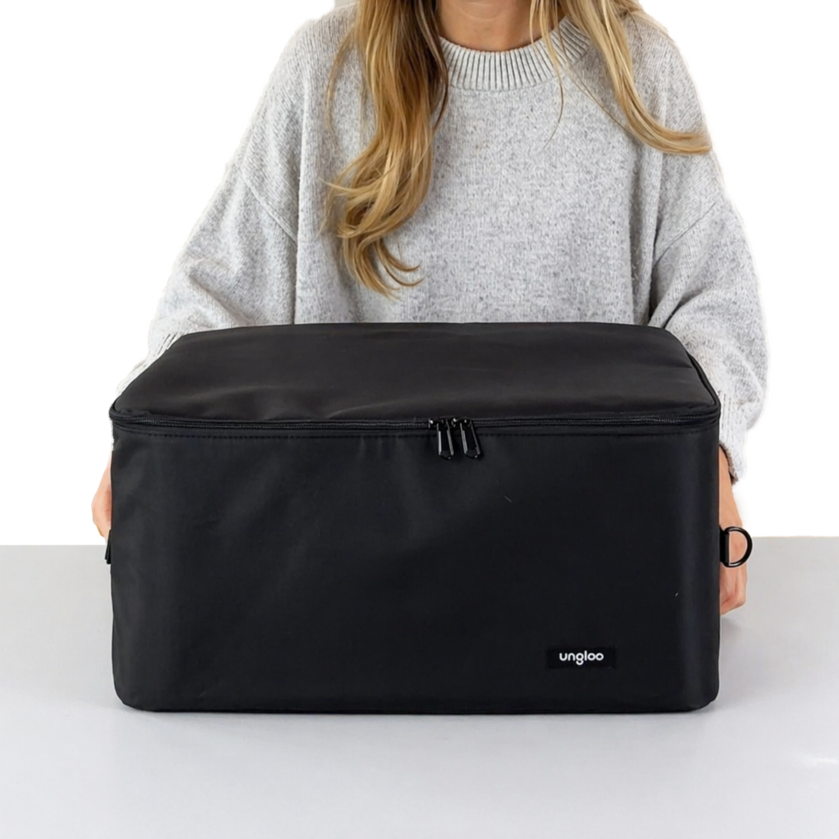 Large travel carrying case for Ungloo Store meditation chair, featuring a secure handle and durable material for easy transport.
